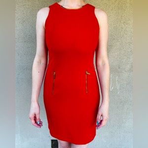 Red Office dress with gold zippers